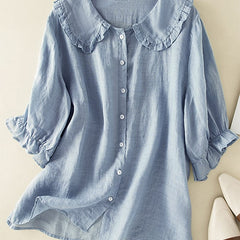 Women’s ruffle linen summer dress by Christine Brewer, showcasing lightweight fabric and feminine ruffle details.