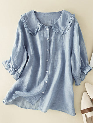 Women’s ruffle linen summer dress by Christine Brewer, showcasing lightweight fabric and feminine ruffle details.