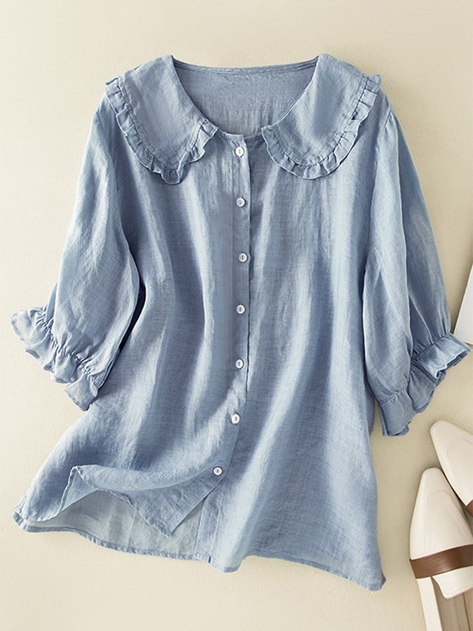 Women’s ruffle linen summer dress by Christine Brewer, showcasing lightweight fabric and feminine ruffle details.