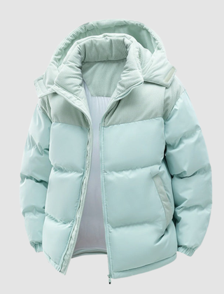 Cora Cosy Puffer Jacket for Women by Christine Brewer, navy blue, insulated winter coat with a hood and quilted design.
