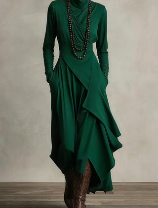 Christine Brewer solid color high-neck long-sleeved irregular casual maxi dress displayed on a hanger.