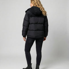 Back view of Christine Brewer Cora cosy puffer jacket for women, showcasing quilted design and warm, stylish winter outerwear.
