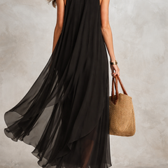 Black layered chiffon maxi dress by Christine Brewer featuring bohemian style and flowing fabric, perfect for elegant summer occasions.