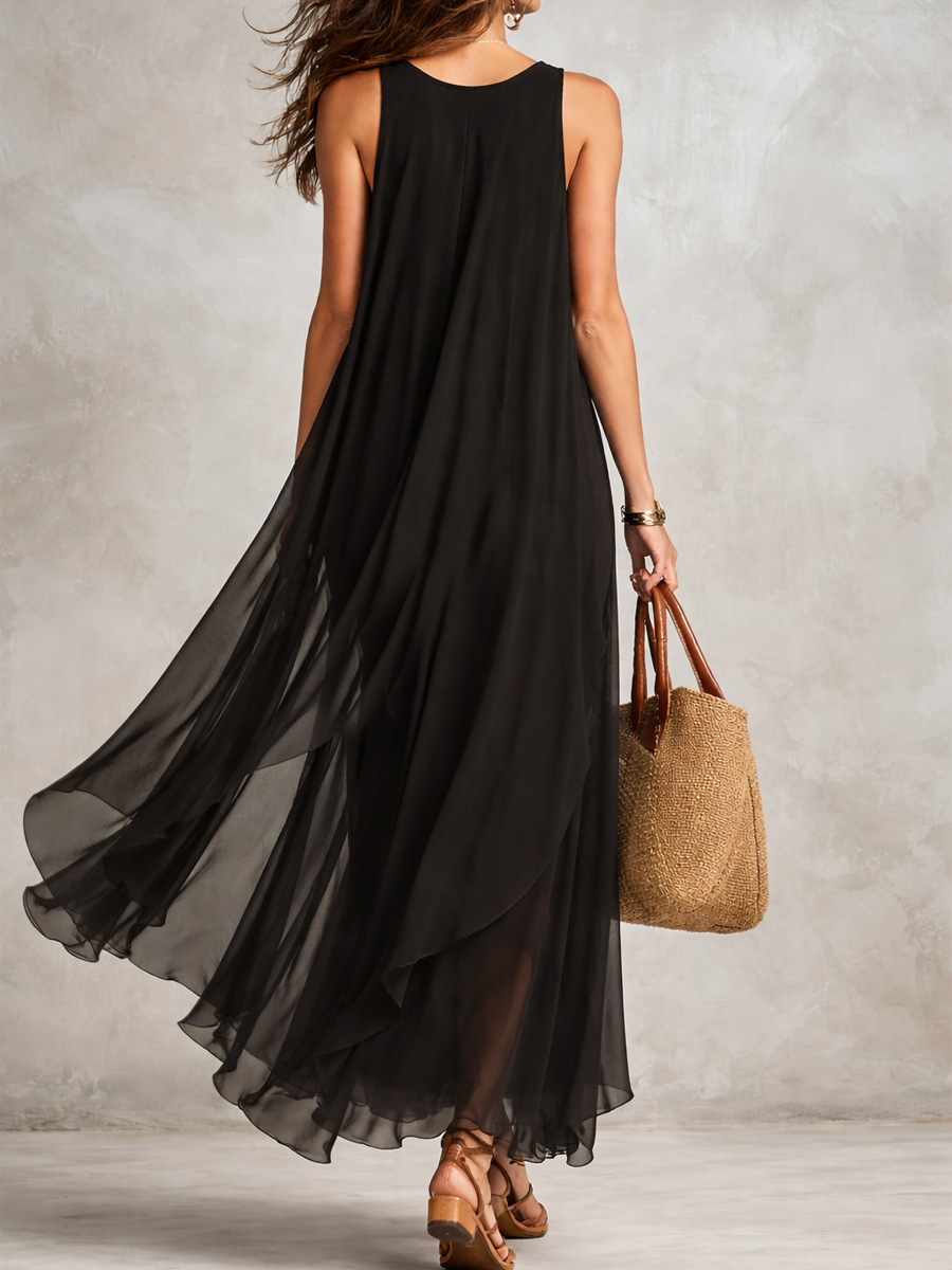Black layered chiffon maxi dress by Christine Brewer featuring bohemian style and flowing fabric, perfect for elegant summer occasions.