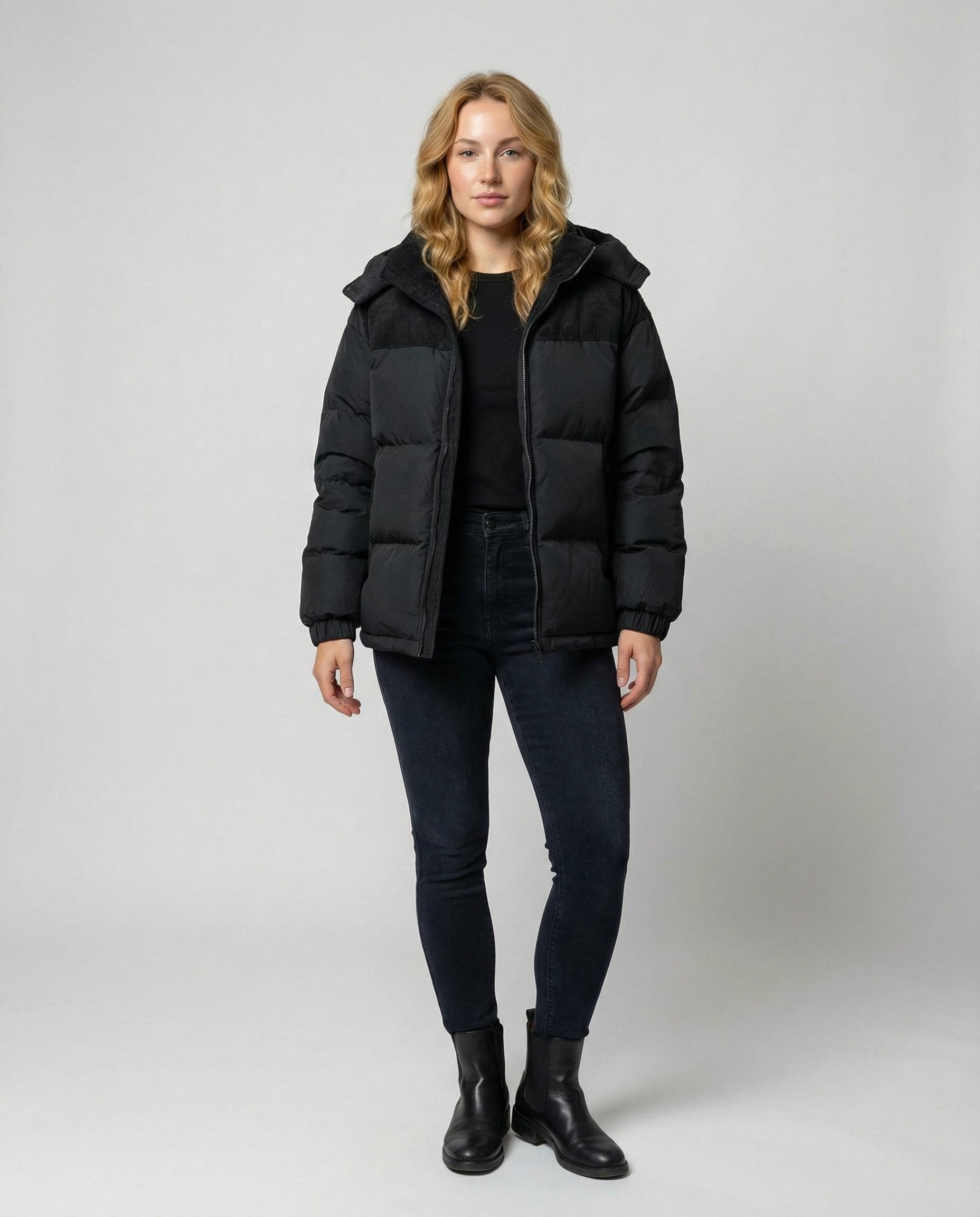 Full-body front view of the Cora Cosy Puffer Jacket for women by Christine Brewer, showcasing its quilted design and cozy fit.