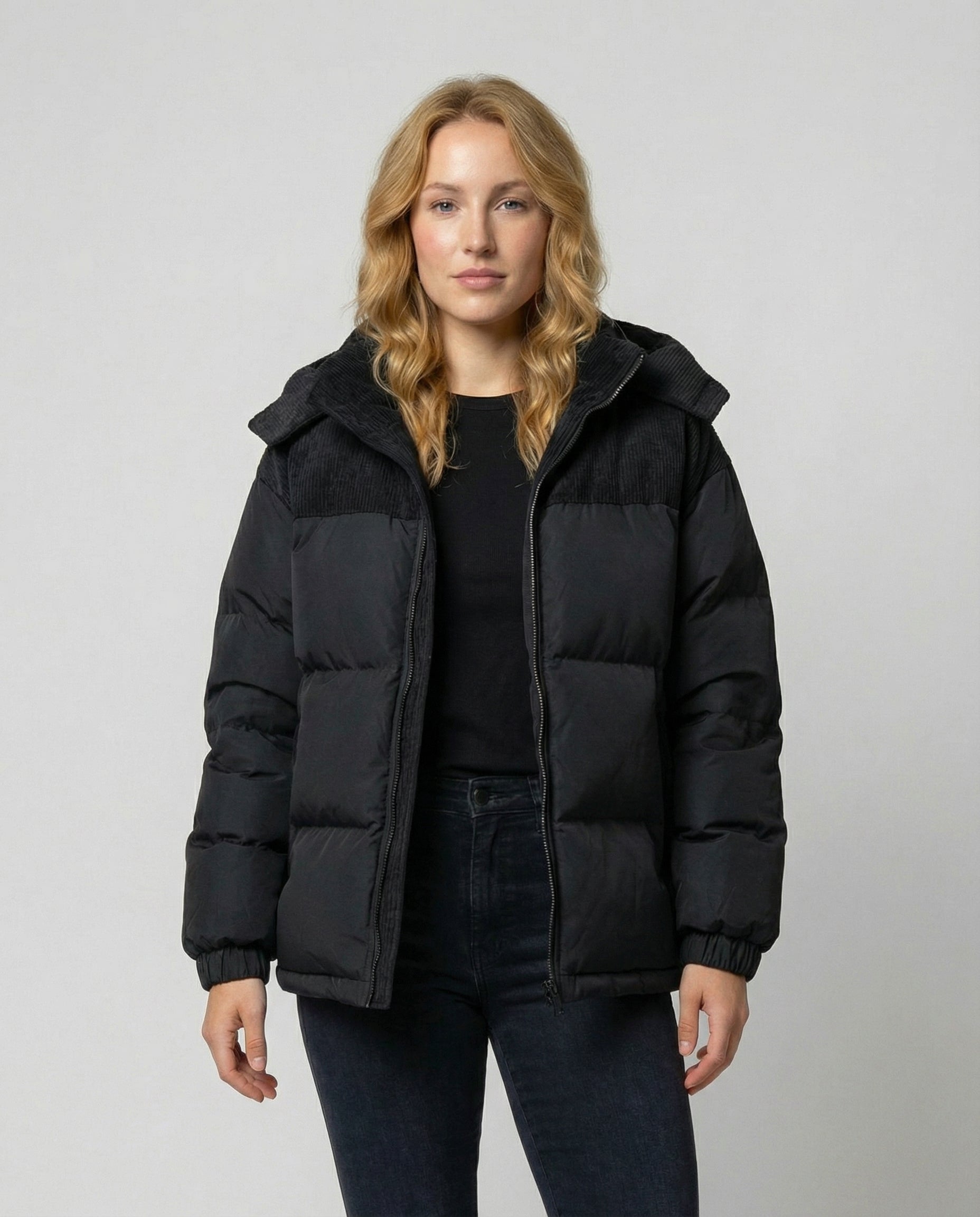 Woman wearing the Cora Cosy Puffer Jacket for Women by Christine Brewer, showcasing the upper body and stylish design.