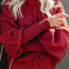 Christine Brewer Mila cable knit high neck sweater for women, showing a cozy, textured knit in a neutral color.
