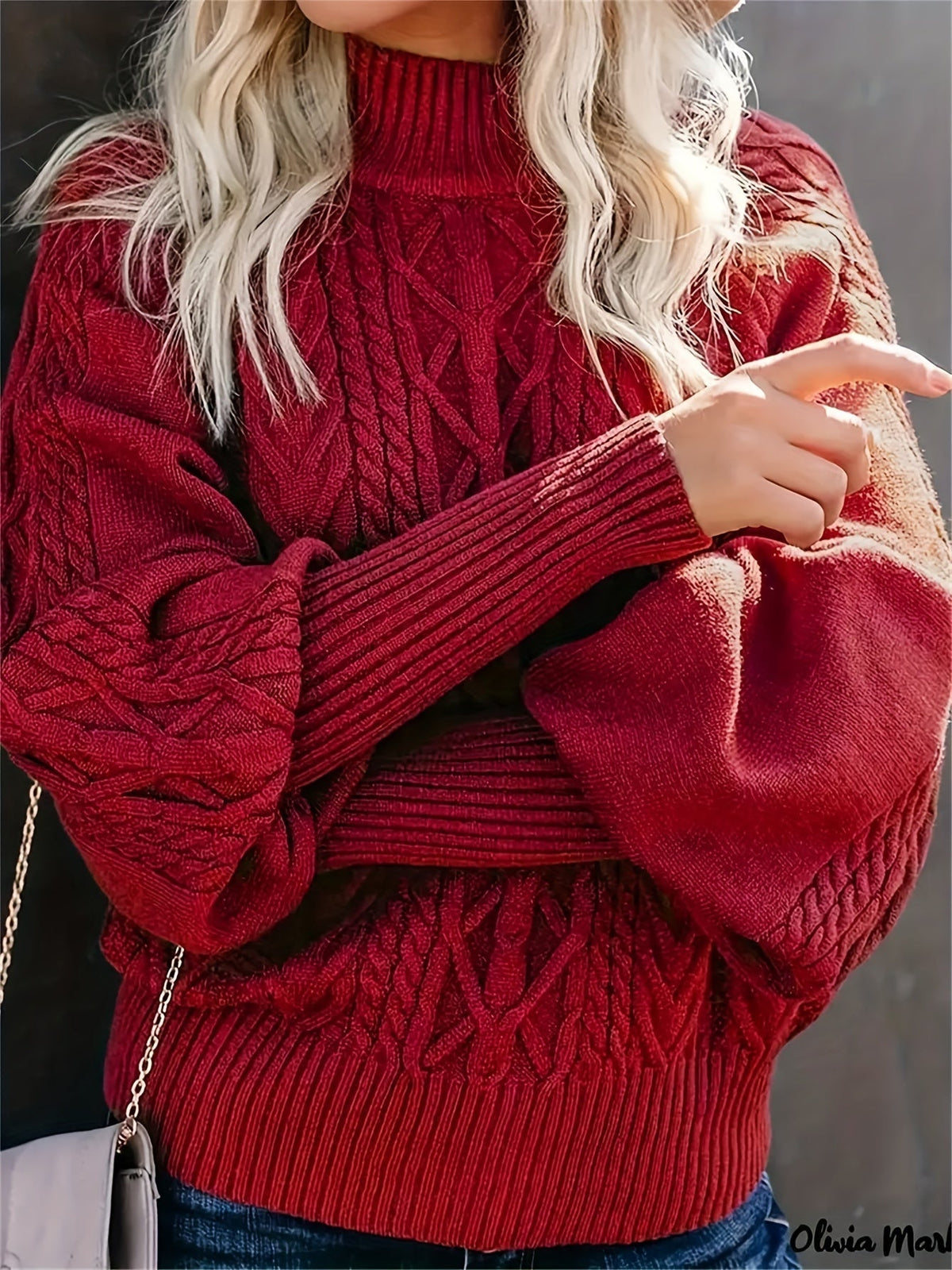 Christine Brewer Mila cable knit high neck sweater for women, showing a cozy, textured knit in a neutral color.