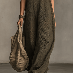 Olive green knit sleeveless maxi dress by Christine Brewer, casual style with a flowing silhouette and V-neck design.