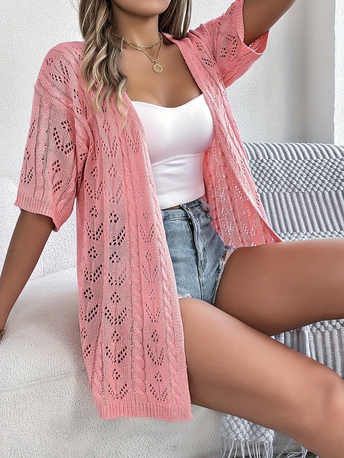 Emma knit cardigan for women by Christine Brewer, featuring a cozy, stylish top with a button-up front and long sleeves.