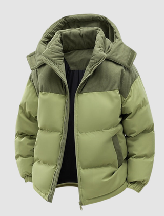 Women’s Cora Cosy Puffer Jacket by Christine Brewer, featuring a warm, quilted design with a hood and zip closure.