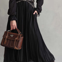 Vintage Christine Brewer lace hem pleated midi dress with button details, showcasing a classic and elegant dress style.