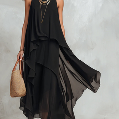 Black layered chiffon maxi dress by Christine Brewer featuring bohemian style and flowing fabric, perfect for elegant occasions.