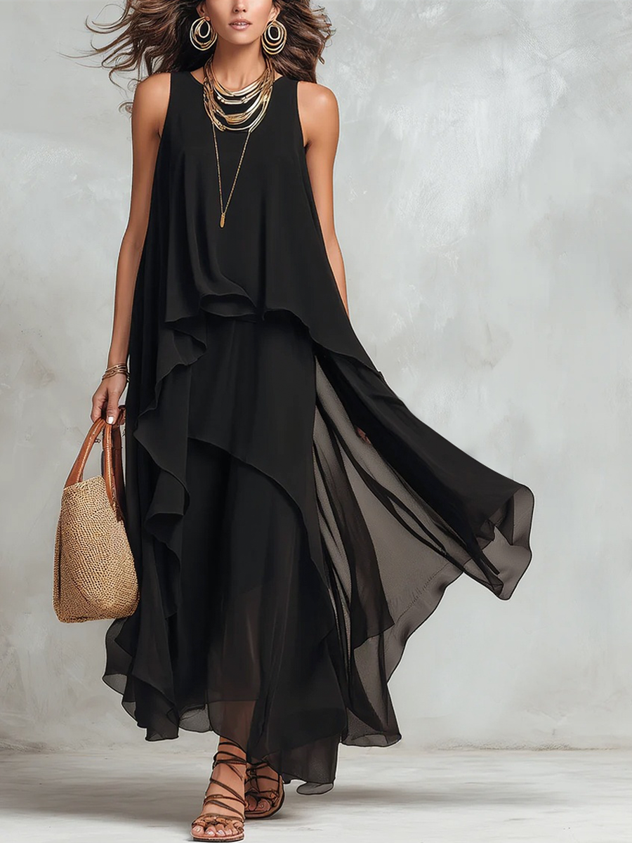 Black layered chiffon maxi dress by Christine Brewer featuring bohemian style and flowing fabric, perfect for elegant occasions.