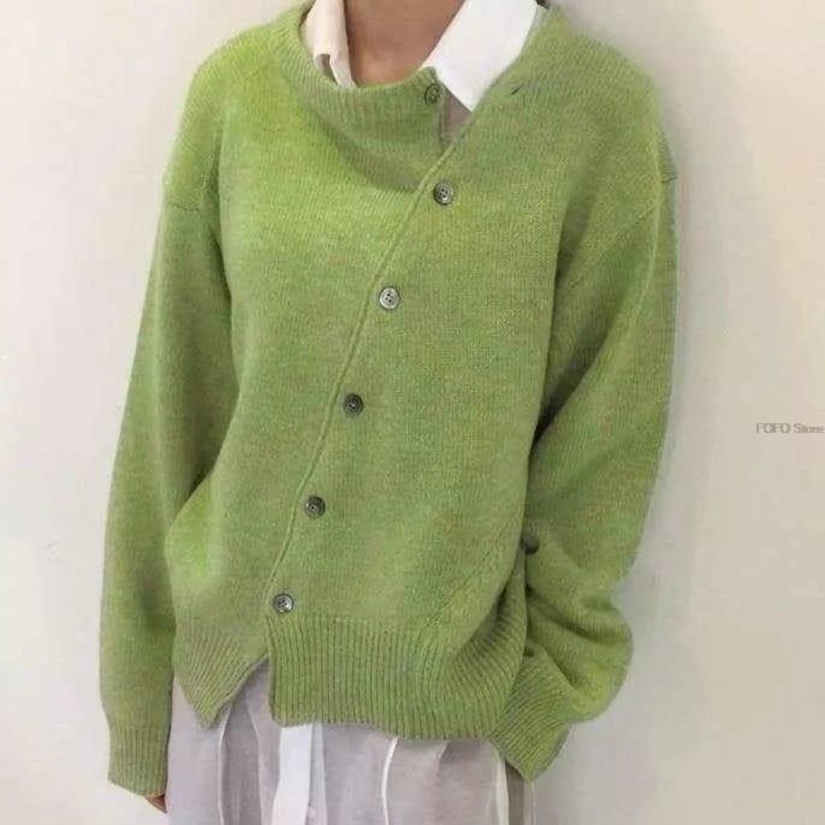 Lucy cozy sweater by Christine Brewer, soft knit fabric, versatile design in neutral color, shown on a model.