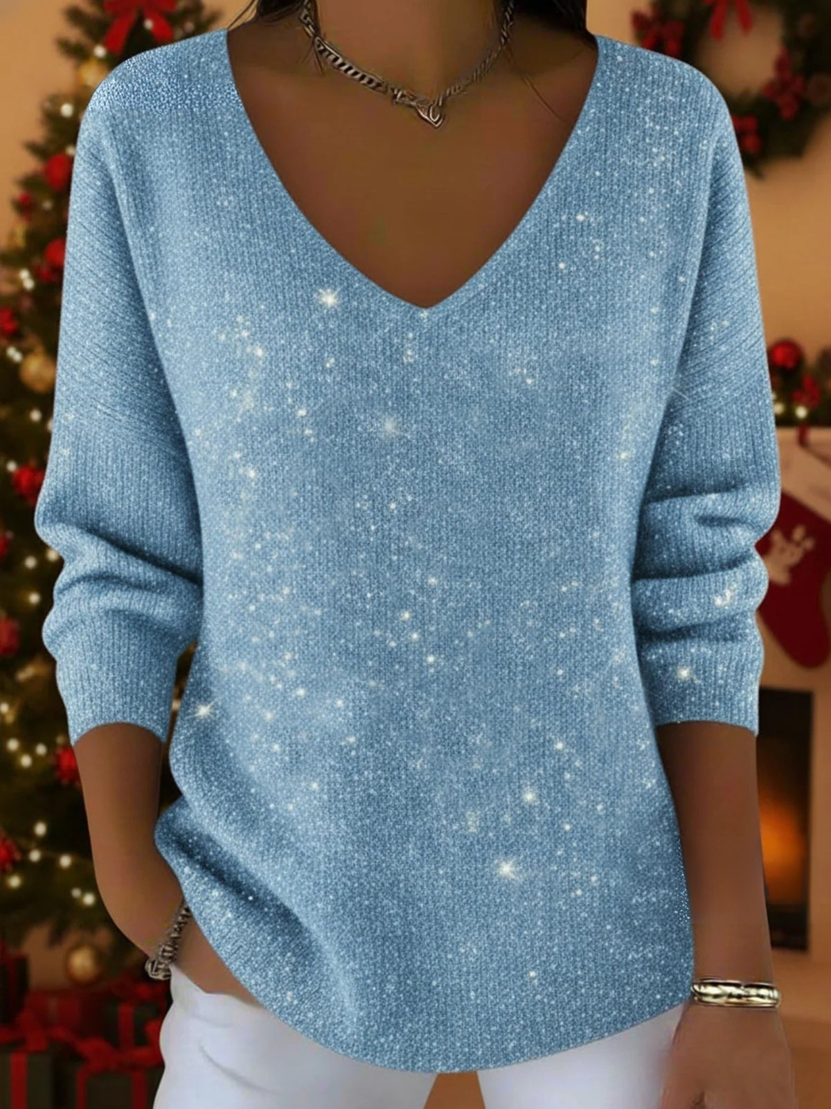 Women’s V-neck Christmas sweater by Christine Brewer featuring festive holiday patterns and cozy knit fabric.