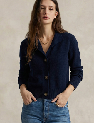 Christina Christine Brewer cashmere high neck women's cardigan, soft beige knit with long sleeves and button closure.