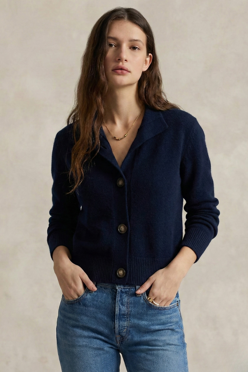 Christina Christine Brewer cashmere high neck women's cardigan, soft beige knit with long sleeves and button closure.
