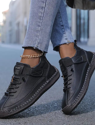 Orthopedic Meya walking sneakers by Christine Brewer with supportive design and cushioned soles, ideal for comfortable walking.