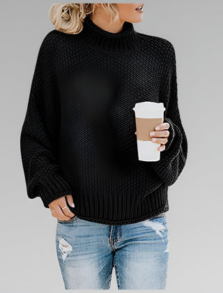 Amy Winifred ribbed orange sweater for women by Christine Brewer, showcasing a close-up of the textured knit fabric.