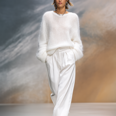 Christine Brewer elegant solid color round neck loose sweater, cozy pullover with a relaxed fit and soft fabric.