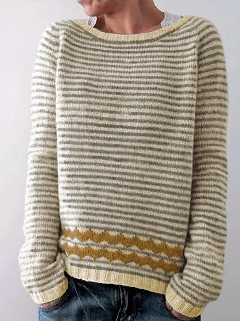 Christine Brewer Holly striped women's sweater featuring colorful horizontal stripes and a cozy knit design.