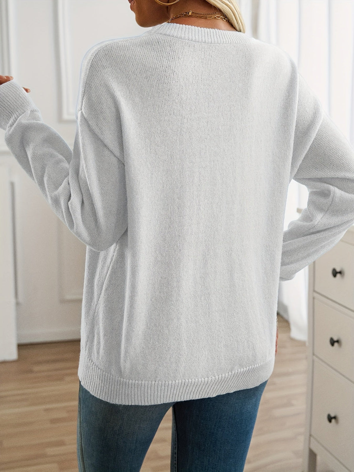 Christine Brewer Mary long sleeve crew neck sweater for women, soft knit fabric in a classic fit, shown on a model.