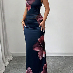 White bodycon sleeveless maxi dress by Christine Brewer with contrast color flower print and round neckline, perfect for summer.
