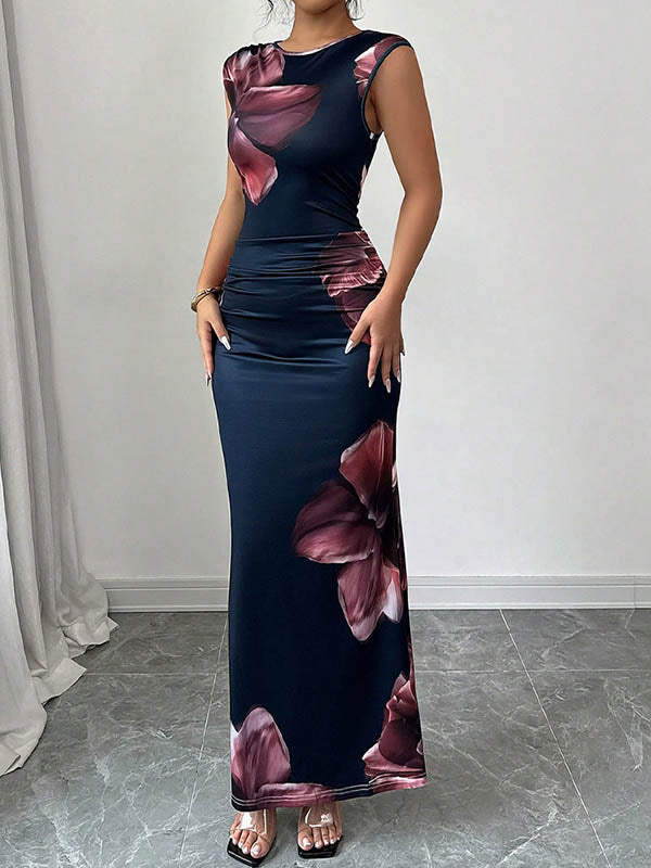 White bodycon sleeveless maxi dress by Christine Brewer with contrast color flower print and round neckline, perfect for summer.