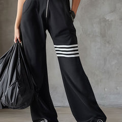 Black striped sleeveless hooded jumpsuit for women by Christine Brewer, featuring a stylish and comfortable pants design.