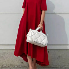 White high-low maxi dress with short sleeves by Christine Brewer, featuring a solid color design and flowing silhouette.