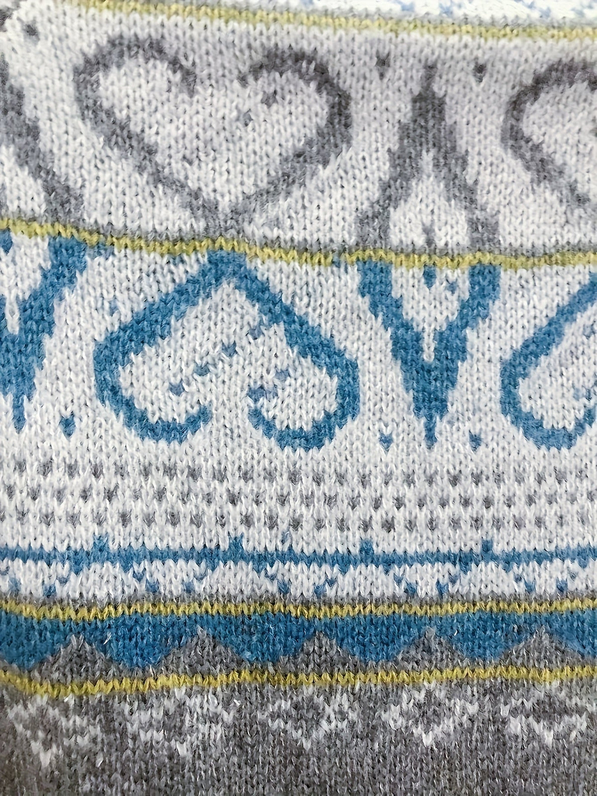 Fair Isle Nordic sweater for women by Christine Brewer, featuring intricate winter pattern in cozy knit fabric.