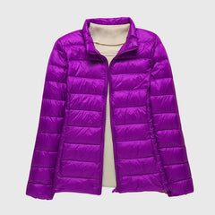 Lightweight quilted jacket named Lily by Christine Brewer, featuring a stylish, ultra-light design perfect for layering and outdoor wear.