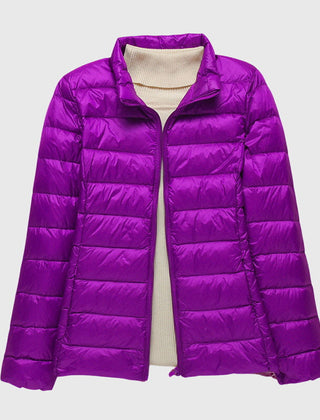 Lightweight quilted jacket named Lily by Christine Brewer, featuring a stylish, ultra-light design perfect for layering and outdoor wear.