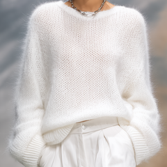 Christine Brewer elegant solid color round neck loose sweater, soft knit pullover with a relaxed fit and cozy design.