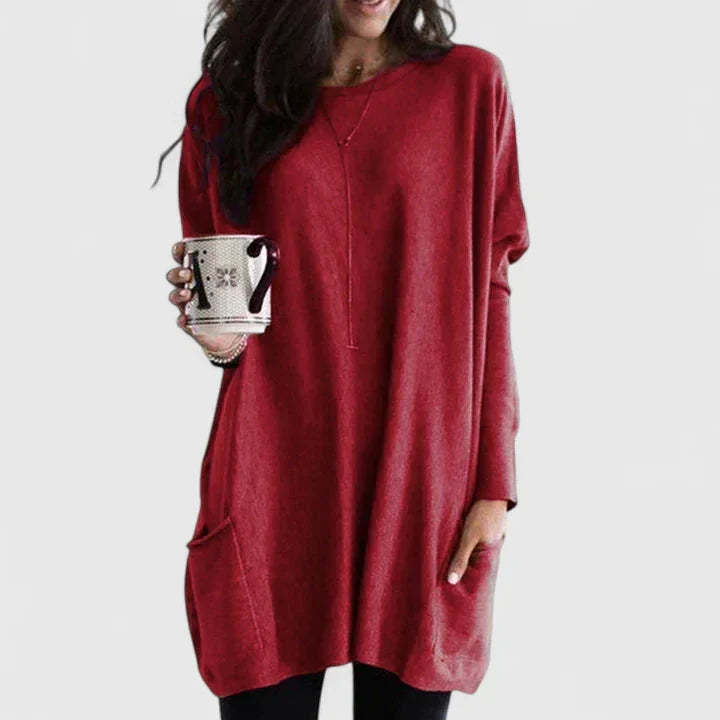 Amber knit sweater for women by Christine Brewer, featuring a cozy, textured knit fabric in a warm amber color.
