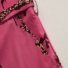 Rose red leopard print chiffon jumpsuit with long sleeves, stylish women's pants by Christine Brewer.