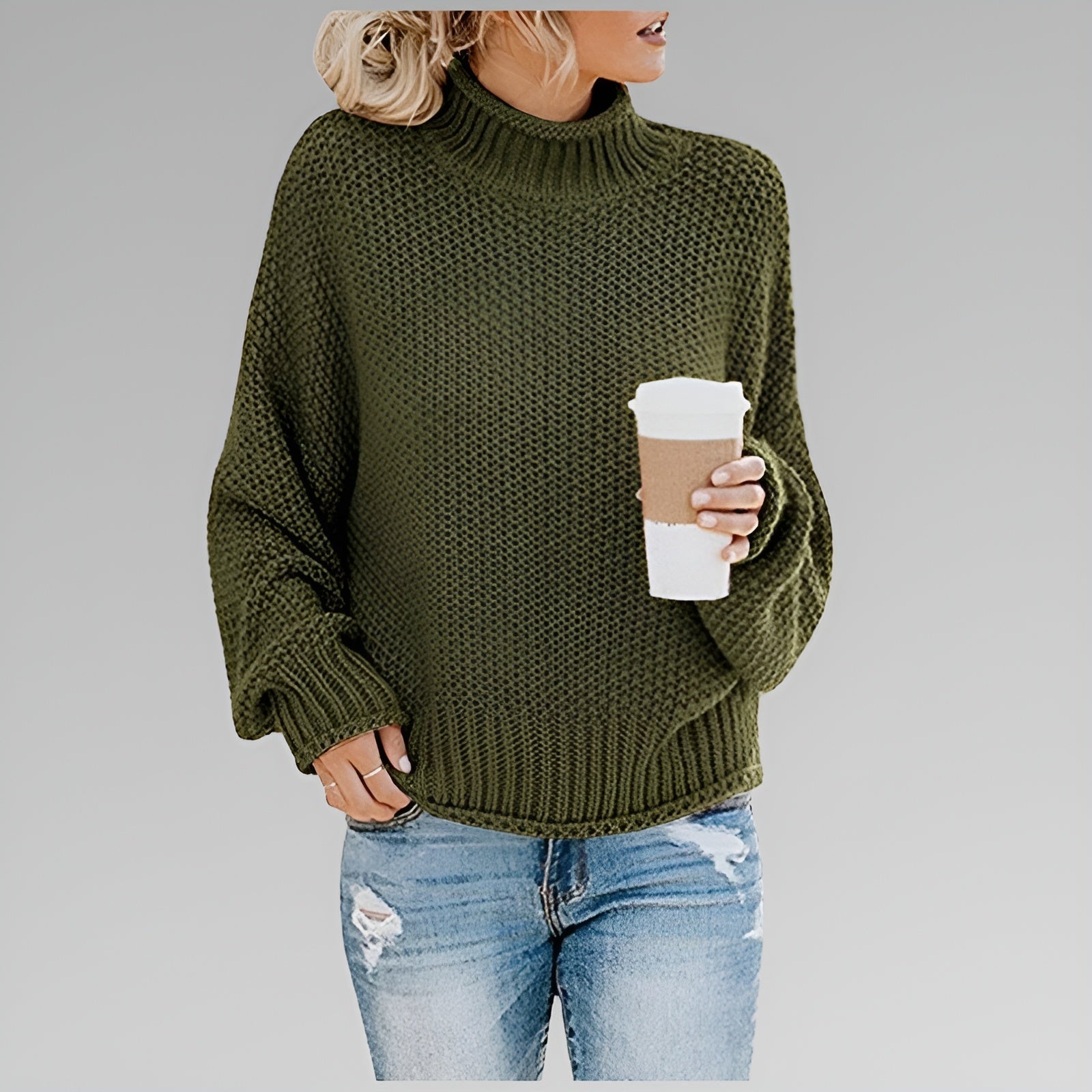 Amy Winifred ribbed orange sweater for women by Christine Brewer, featuring a close-up of the textured knit fabric.