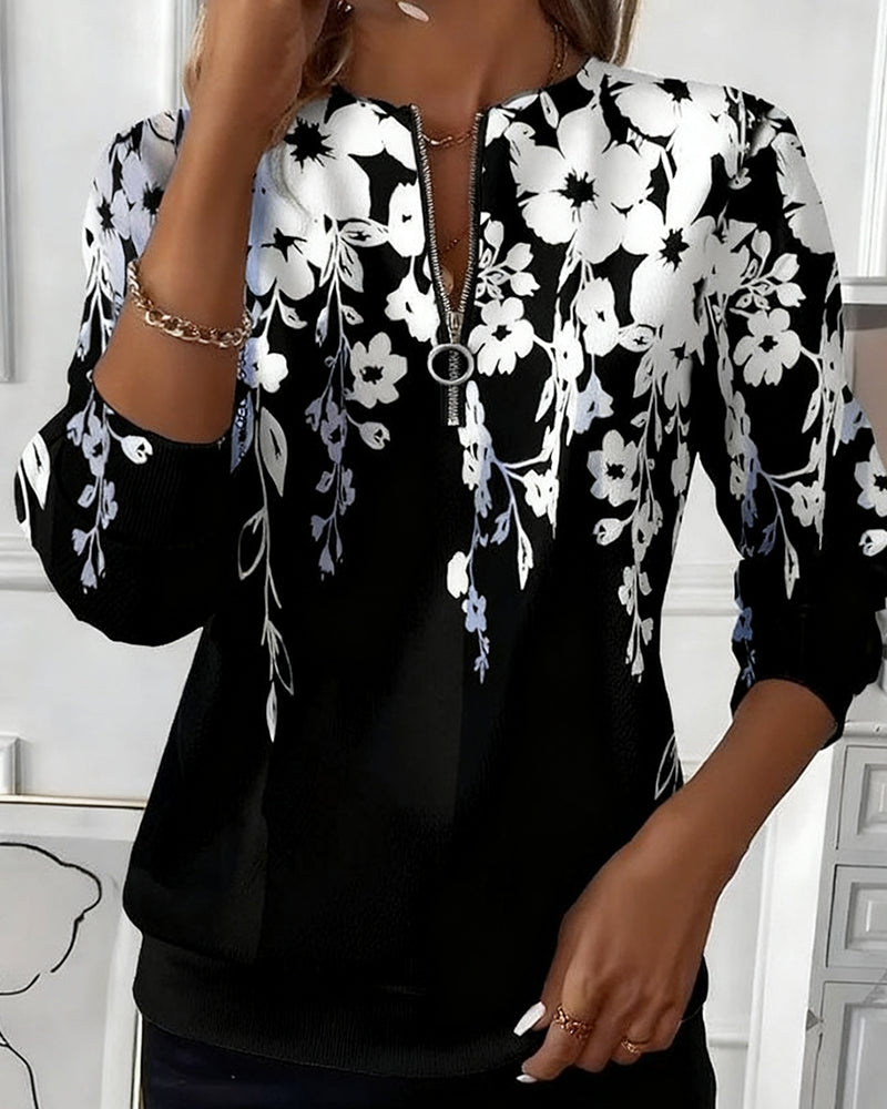 Woman wearing a Christine Brewer Poppy graphic half-zip sweatshirt, stylish hoodie with bold poppy design, casual activewear for women.
