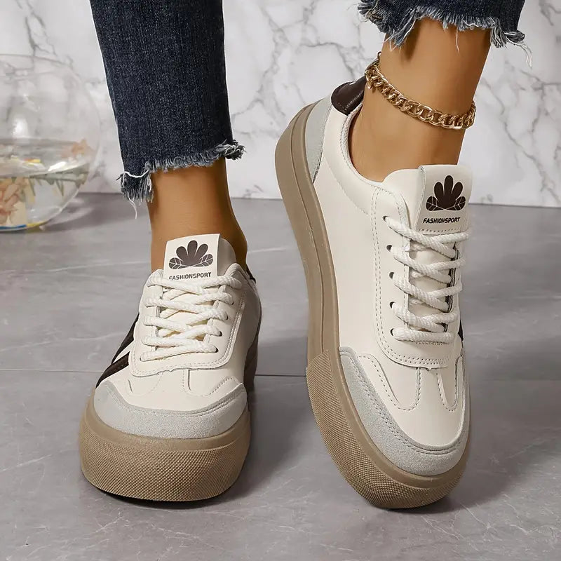 Elegant striped flowy sneakers for women by Christine Brewer, featuring a stylish design and comfortable fit.