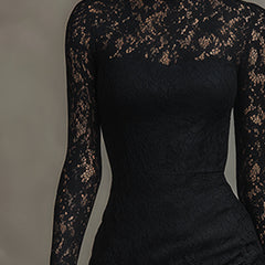 Black lace fishtail maxi dress by Christine Brewer, elegant evening dress with intricate lace details and fitted silhouette.