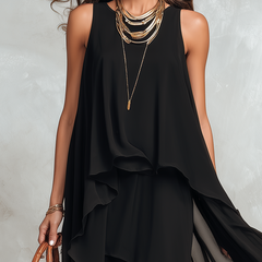 Black bohemian layered chiffon maxi dress by Christine Brewer featuring flowing fabric and tiered design for a stylish look.
