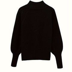 Christine Brewer Mila cable knit high neck sweater for women, showcasing a cozy, textured knit with a high neckline and long sleeves.
