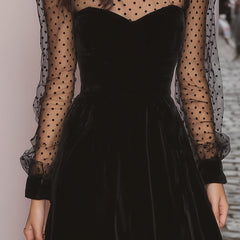 Elegant velvet evening dress by Christine Brewer featuring a flowing silhouette and rich fabric for formal occasions.