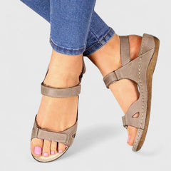 Open-toe ankle-strap sandals for women by Christine Brewer, featuring stylish design and comfortable fit.