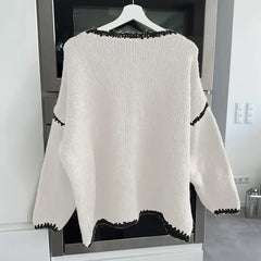 Christine Brewer Taylor women's knit sweater in cozy, soft fabric, featuring a classic crew neck and ribbed cuffs.