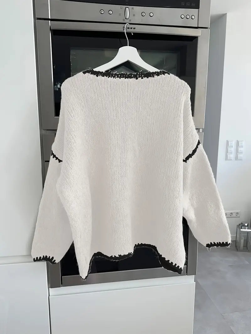 Christine Brewer Taylor women's knit sweater in cozy, soft fabric, featuring a classic crew neck and ribbed cuffs.