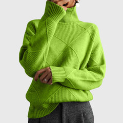 Cream-colored Laura turtleneck sweater for women by Christine Brewer, featuring a cozy knit design and fitted style.