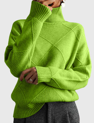 Cream-colored Laura turtleneck sweater for women by Christine Brewer, featuring a cozy knit design and fitted style.