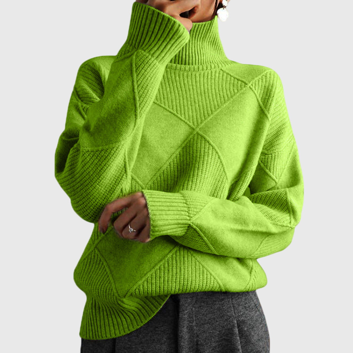 Cream-colored Laura turtleneck sweater for women by Christine Brewer, featuring a cozy knit design and fitted style.